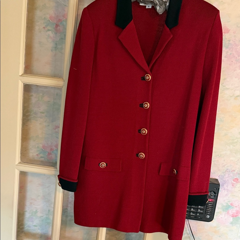 St. John Collection Elegant Black Knitwear. This classic Jacket is a deep red.